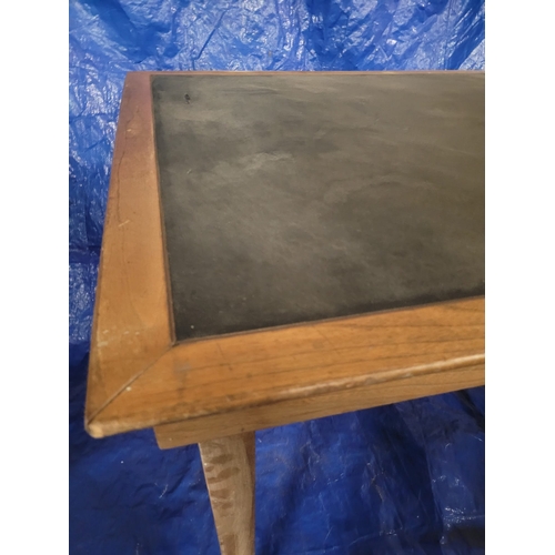 21 - A NEAT SIZED VINTAGE OAK FOLDING TABLE WITH BLACK VINYL TOP. 34 CM X 34 CM. From Christian Brothers ... 