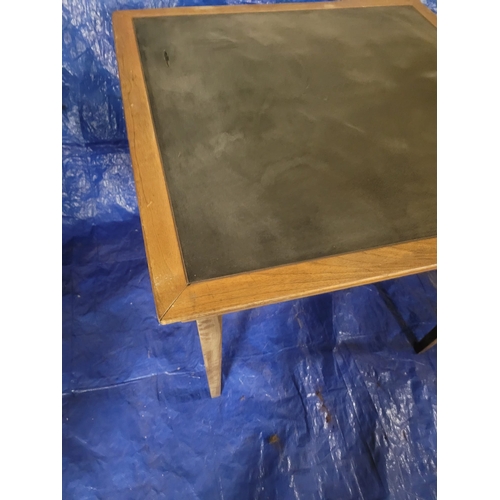 21 - A NEAT SIZED VINTAGE OAK FOLDING TABLE WITH BLACK VINYL TOP. 34 CM X 34 CM. From Christian Brothers ... 