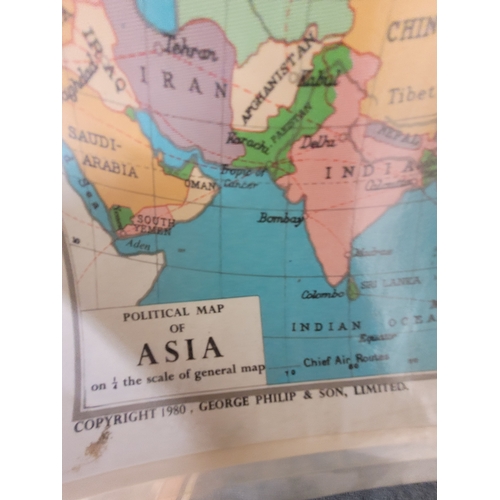 161 - Philip's roll of 4 maps of Asia bound together. 1985, 1980, 1979 and 1975.