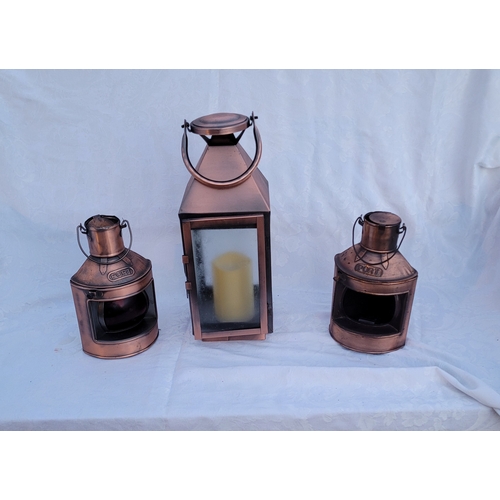 34 - Decorative copper effect lanterns