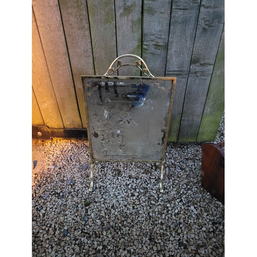 43 - Brass fire screen with distressed mirror front