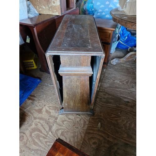 93 - A solid oak drop leaf table