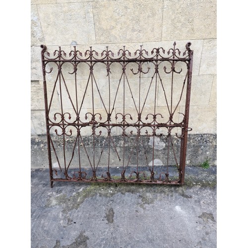 76 - X2 Early twentieth century wrought iron gates. 4.5ft x 4.5ft

*correction..  gates not hanging windo... 