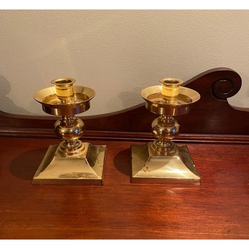 146 - Pair of Waterford Crystal brass candlestick holders.