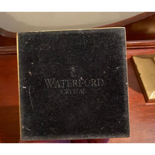 146 - Pair of Waterford Crystal brass candlestick holders.