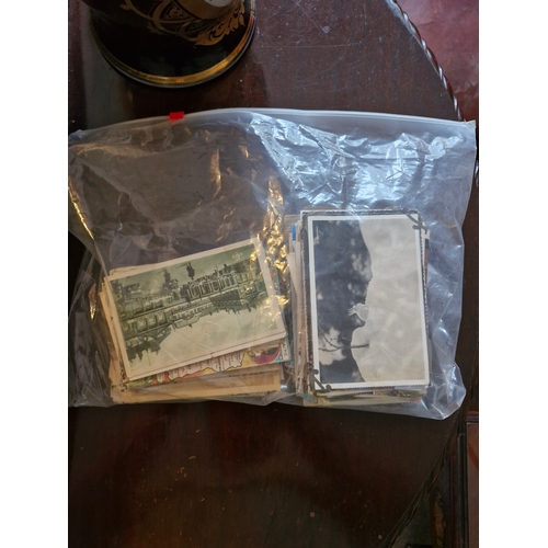 169 - A large selection of postcards