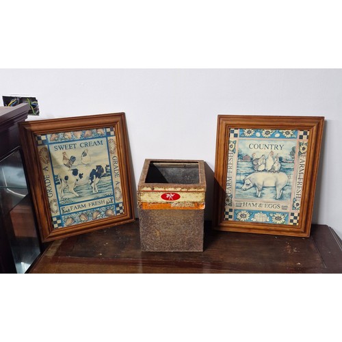 143 - A Jacobs Biscuit tin and a pair of Butcher's wall art