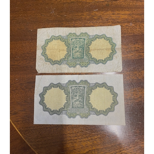 68 - A pair of lady lavery pound notes.