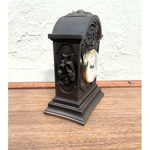 145 - Mantle clock with golf motif -