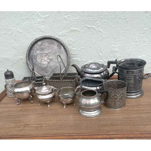 171 - A collection of silver plated items to include a crystal salt shaker and 2 wired condement baskets