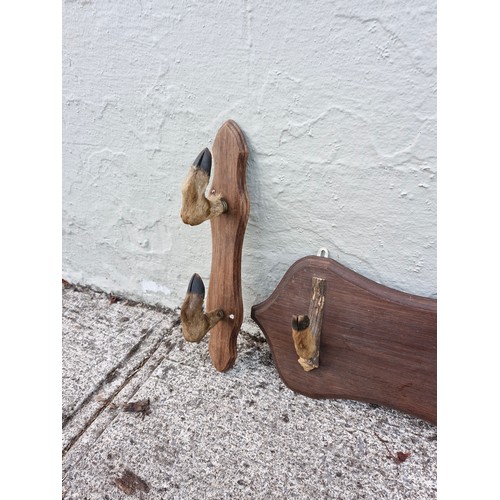 52 - Taxidermy  deer hoof hangers and a hanger /  gunrest