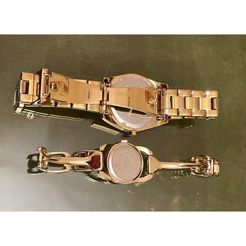 305 - 2 wrist watches by DKNY and Omaki, running order