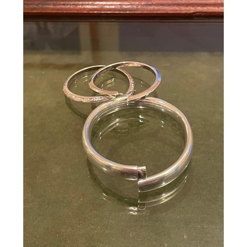 311 - Silver bangle bracelet and 925 ear-rings, weight 30.8 grams