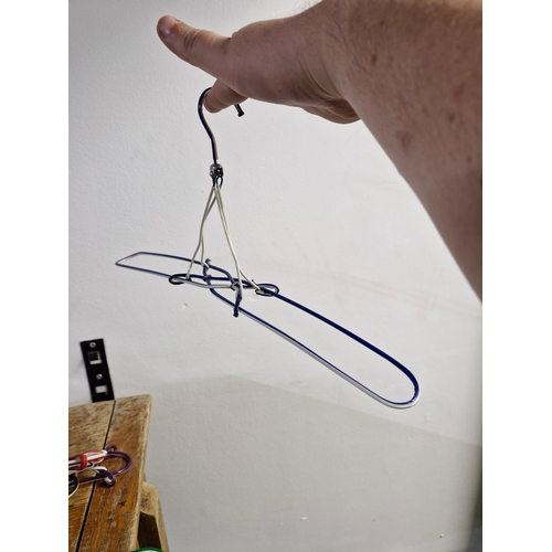 21 - A collection of interesting vintage clothes hangers