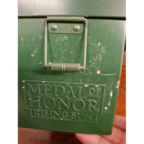 23 - Medal of Honor collectors case in manner of ammo tin. Plus metal toy soldiers (damaged).