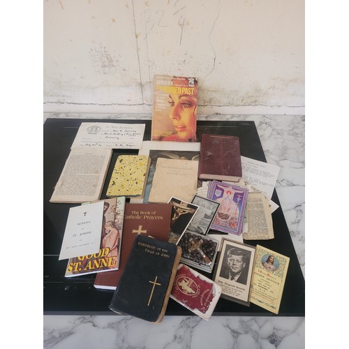 59 - A collection of religious ephemera to include a mass/remembrance card for John F. Kennedy