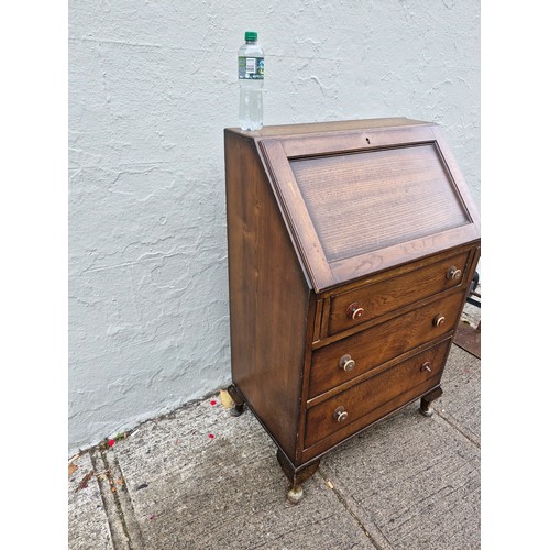 74 - An early 1900s drop front bureau