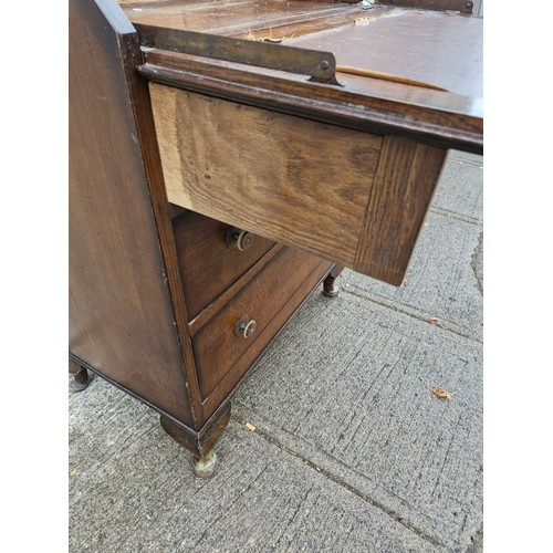 74 - An early 1900s drop front bureau