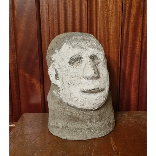 155 - Sculptural impression of a head.