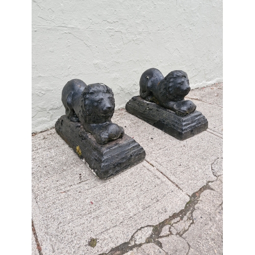 225 - A pair of concrete garden lions