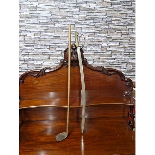 193 - An old golf club and an old decorative dress sword