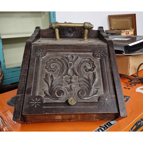 227 - An Edwardian oak coal scuttle complete with insert and shovel