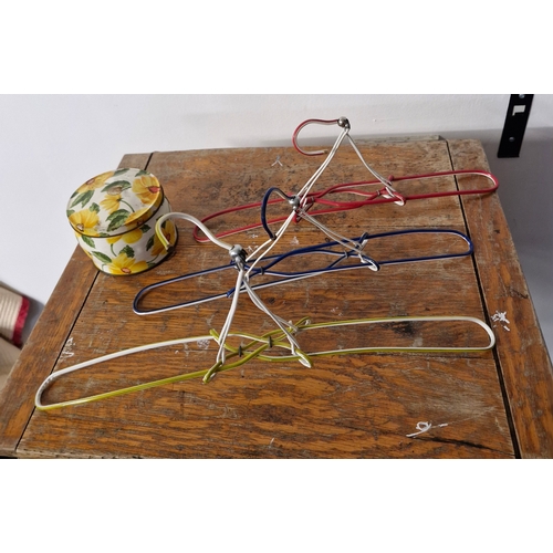 270 - A set of 7 1970s collapsible clothes hangers.  9 in total.