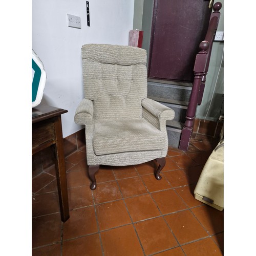 294 - a mid to late 1900s wing backed arm chair -