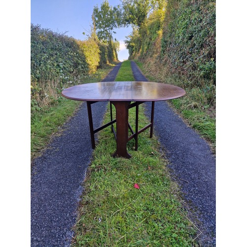 284 - A vintage drop leaf table