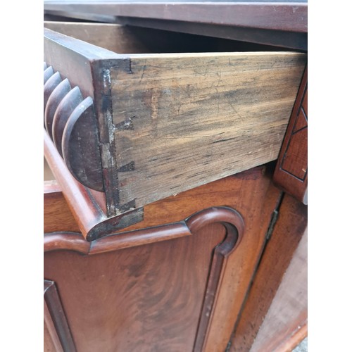 302 - A victorian mahogany sideboard with original glass nobs