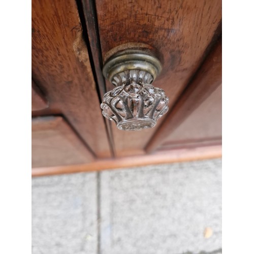 302 - A victorian mahogany sideboard with original glass nobs