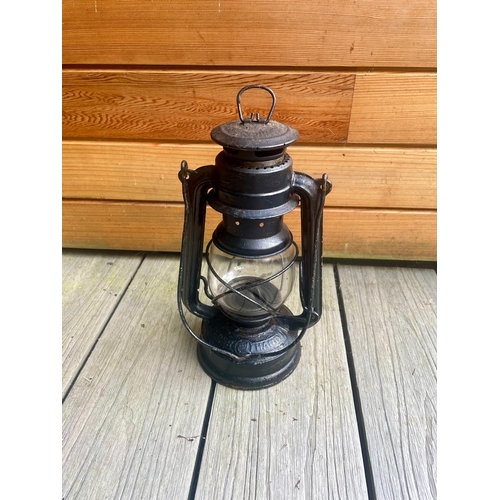 375 - A pair of church lanterns and an oil lantern.