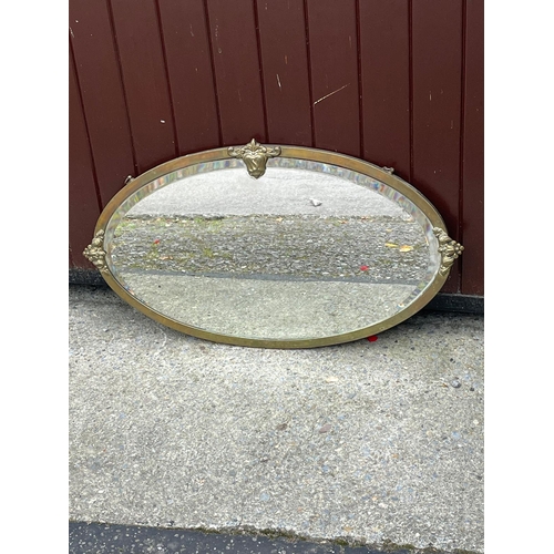 397 - An Edwardian brass rimmed mirror