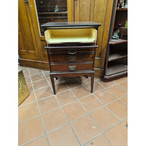 406 - An Edwardian mahogany music cabinet