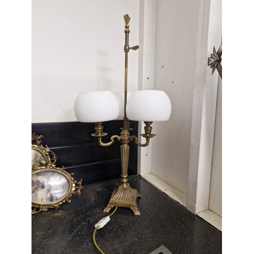 415 - An Art deco style lamp with milk glass light shades.