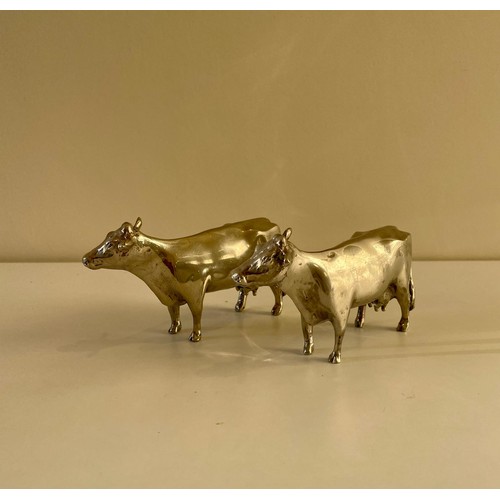 4 - Pair of pewter cows