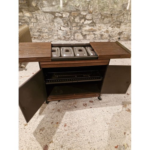 123 - Vintage hot plate service trolley and a vintage Dimplex electric heater