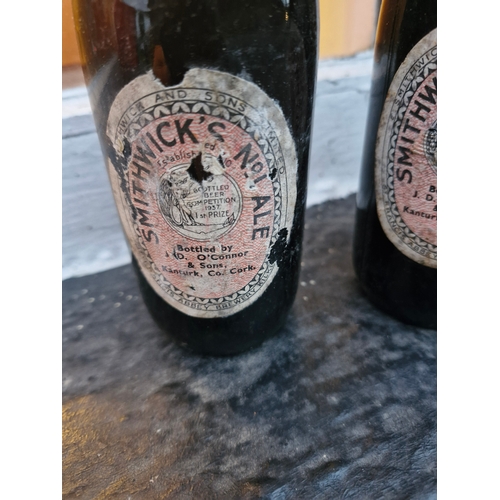 136 - Two unopened Guinness bottles. Bottled by J D O'connor and Sons Kanturk.