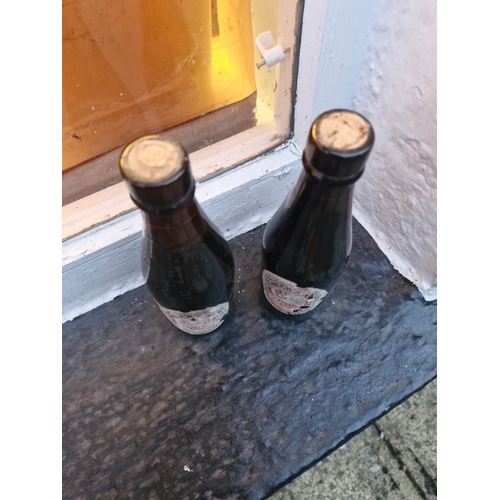 136 - Two unopened Guinness bottles. Bottled by J D O'connor and Sons Kanturk.