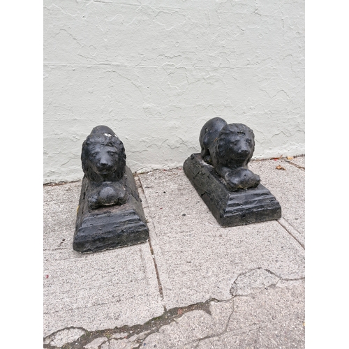 181 - A pair of concrete garden lions