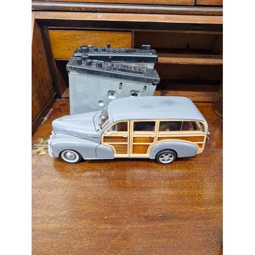 102 - A model 1948 Chevrolet Freetmaster Woody plus 2 car stereos, piomeer and philips.