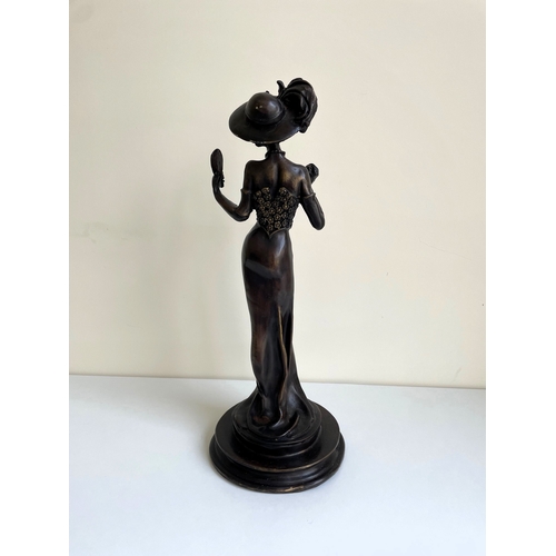 23 - Bronzed Plaster figure of a lady in the manner of Giulio Mancini Lady with a mirror