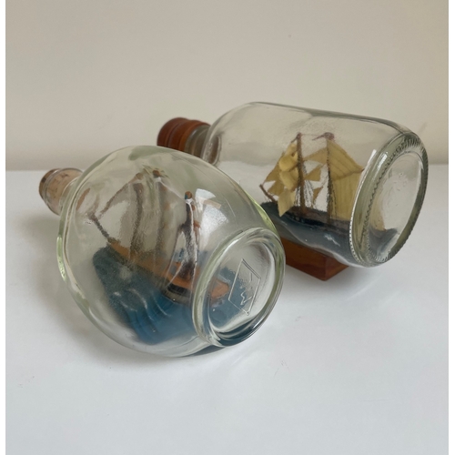 45 - Pair of vintage ships in bottles