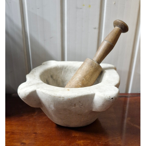 7 - Marble pestle and mortar