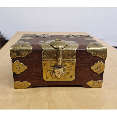 59 - An early 1900s brass bound jewellery box.