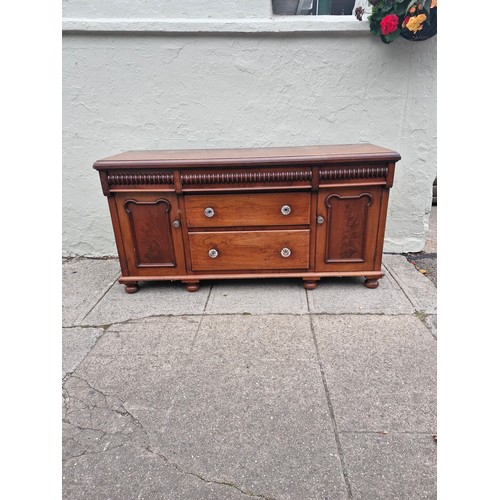 205 - A victorian mahogany sideboard with original glass nobs