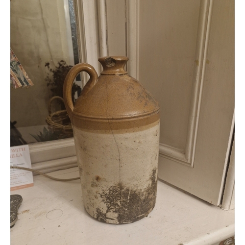 253 - Large Stoneware Whiskey Flagon ..cracked