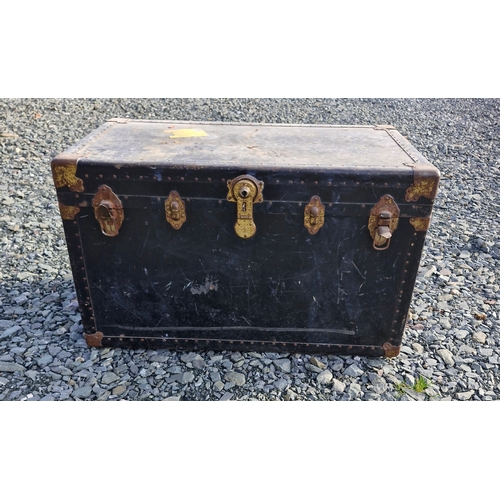 62 - A large vintage steamer trunk - damaged underside