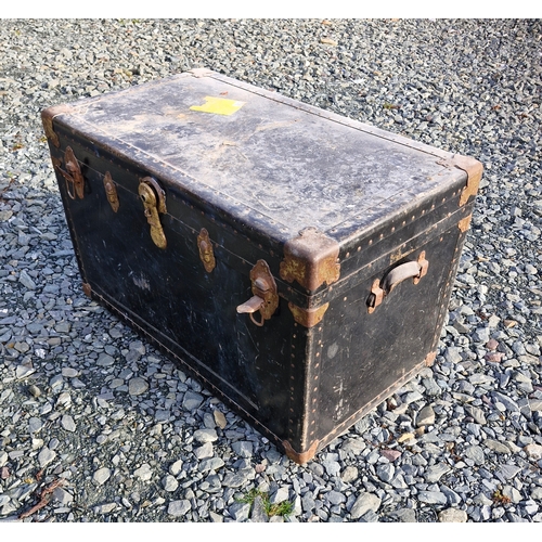 62 - A large vintage steamer trunk - damaged underside