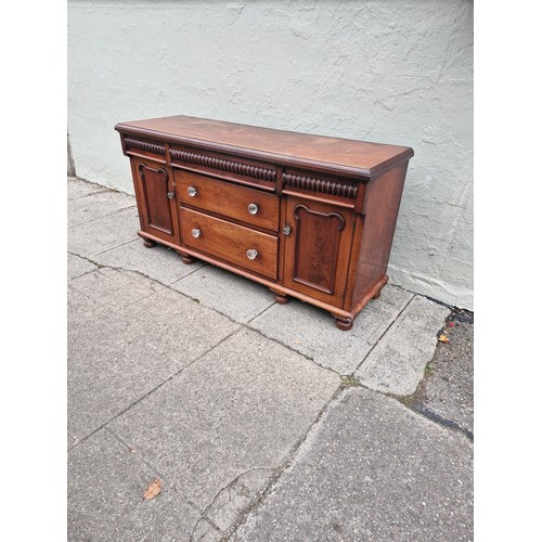 105 - A Victorian mahogany sideboard with original glass nobs